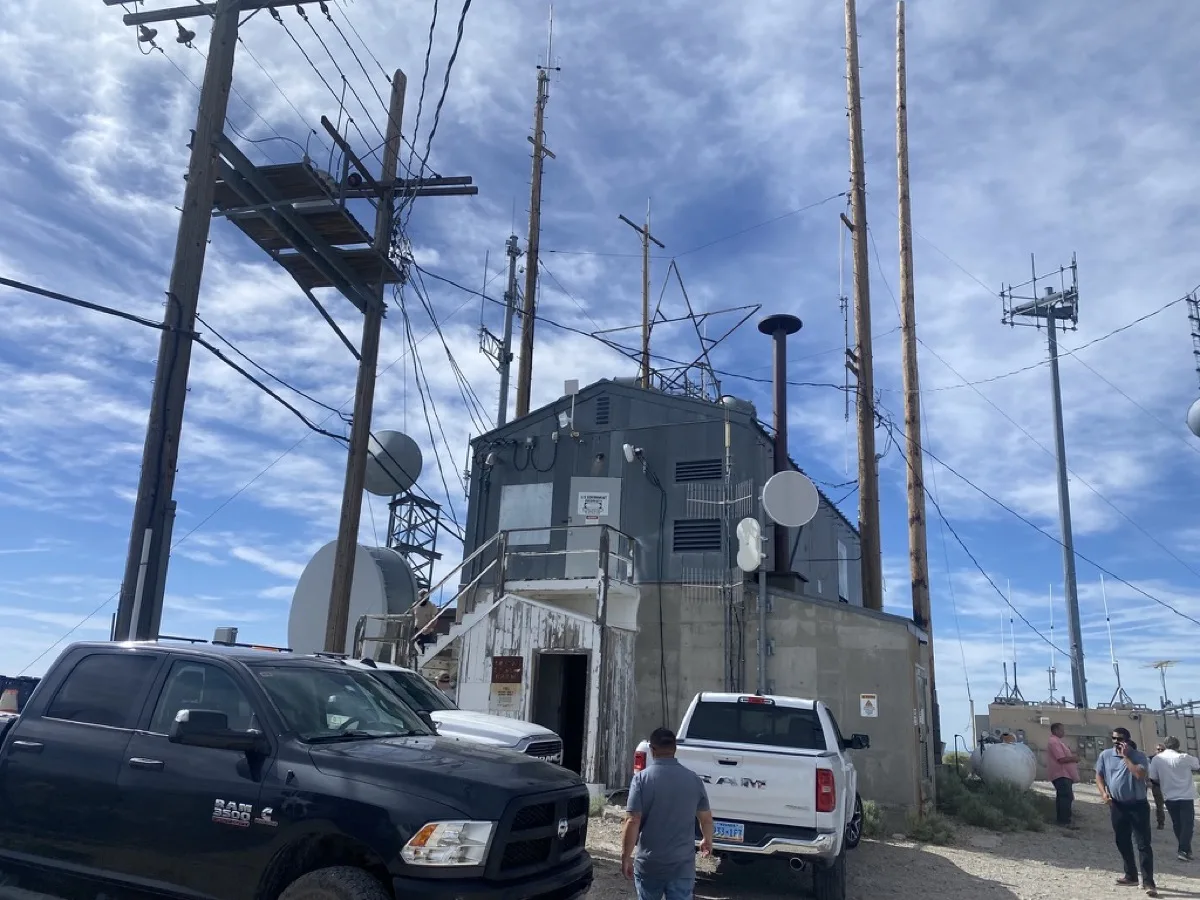 Communications site on Brock Mountain with towers, dishes, and summit buildings