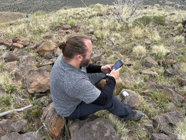 Checking the mesh handheld on the rocky Spanish Benchmark slopes